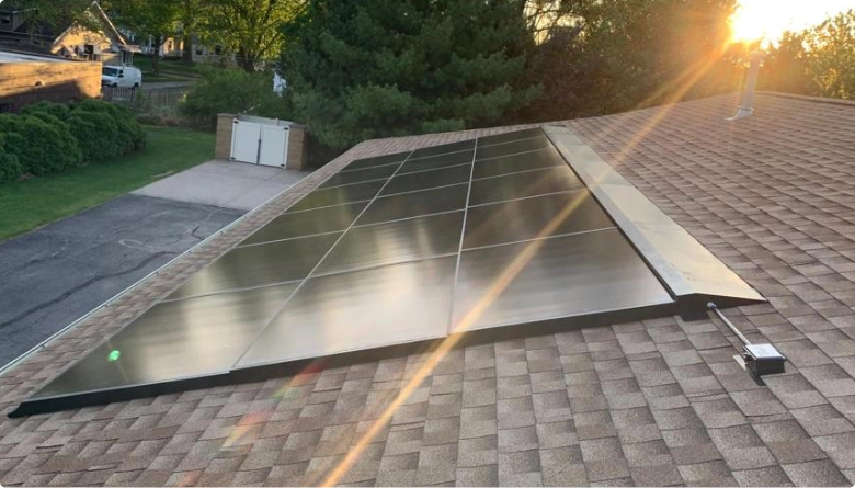 image of solar panels installed on angled side of a residential roof